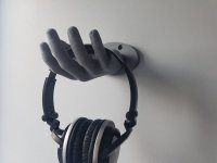 protruding-hand-wall-mounted-earphone-holder-600x450.jpg